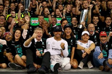 Hamilton and Scherzinger sit after the driver won the World Championship
